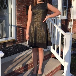 black and gold short dress sleeveless v back